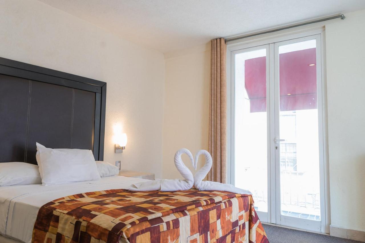 פואבלה Hotel Posada Guadalupe מראה חיצוני תמונה